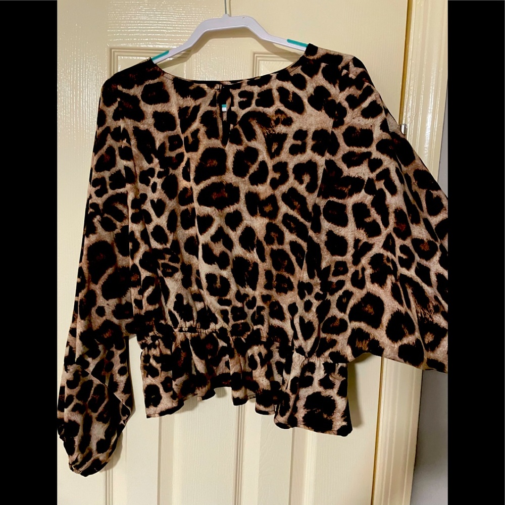 Women’s size XL leopard print top